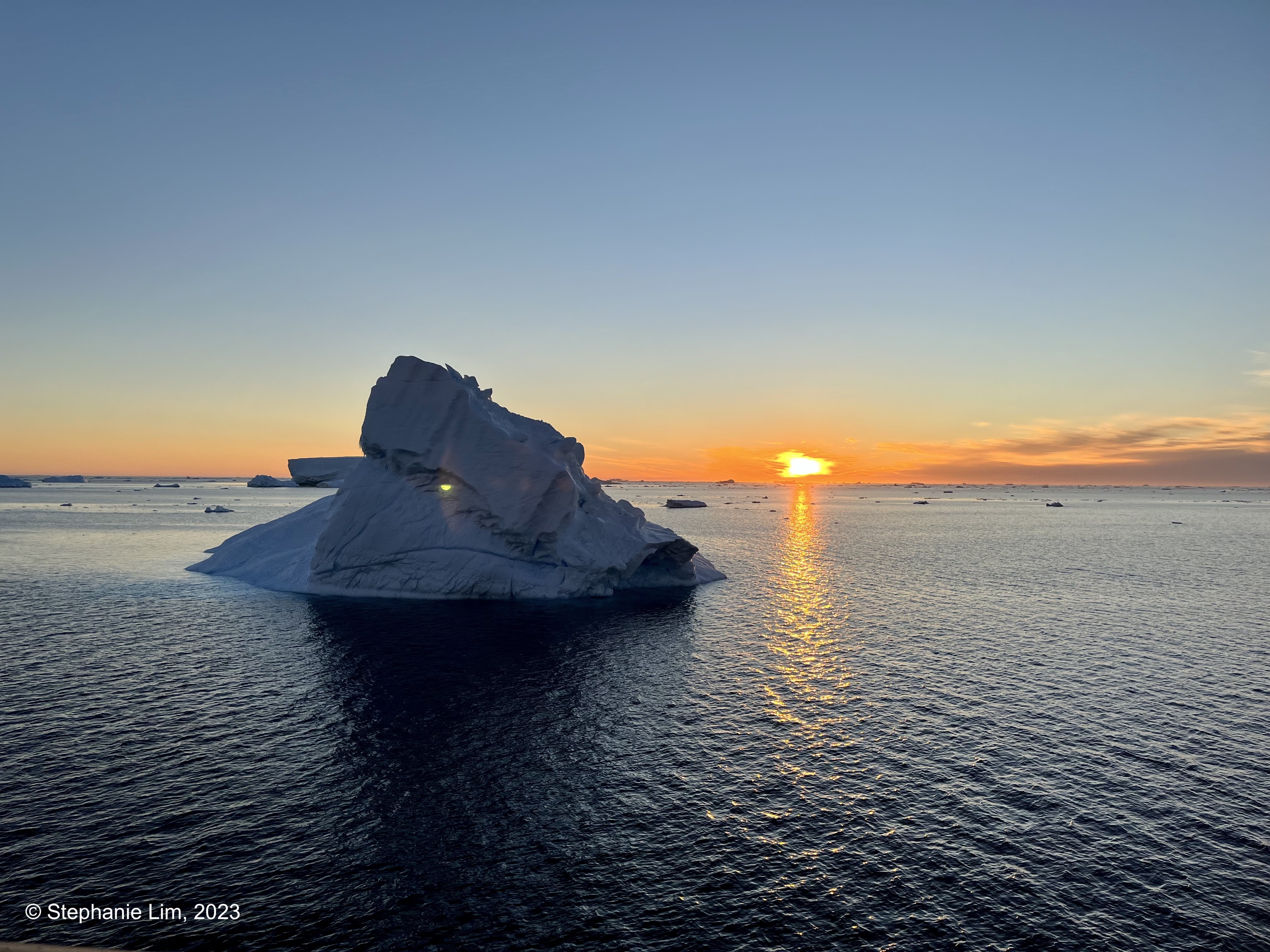 Antarctic iceberg at sunset